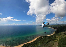 万宁正门岭海崖滑翔伞飞行营地一日游【万宁滑翔伞/专业教练一带一/海景滑翔伞】