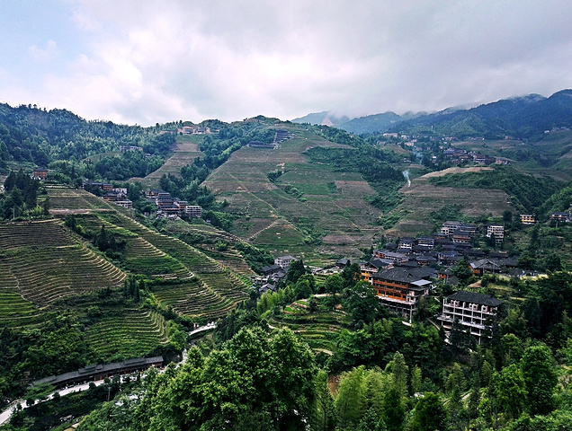 "早上起来脚还是很累，所以没有去西山韶乐观日出，吃过早餐后直接去了千层天梯观景，_遇龙桥"的评论图片