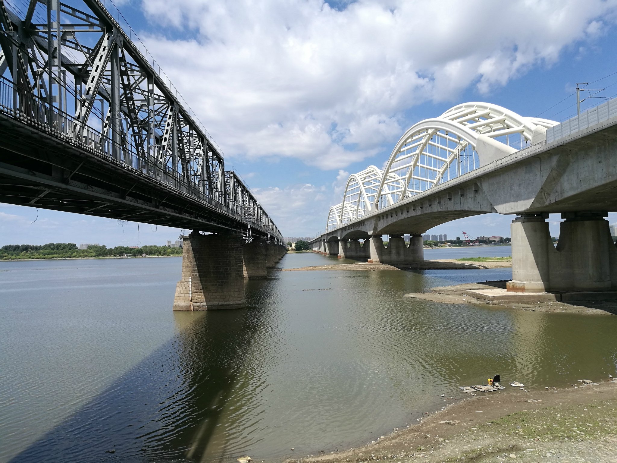 桥松花江滨州铁路桥是松花江上最早的铁路大桥也是哈尔滨的第一座跨江