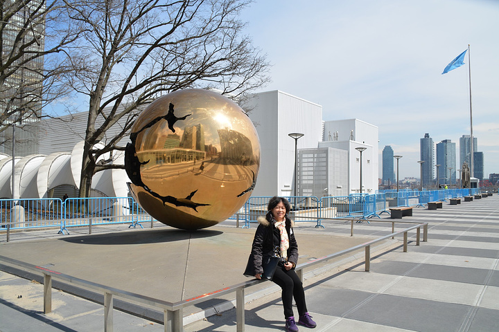 .杆,悬挂着联合国成员国的国旗,但需注意的是,休