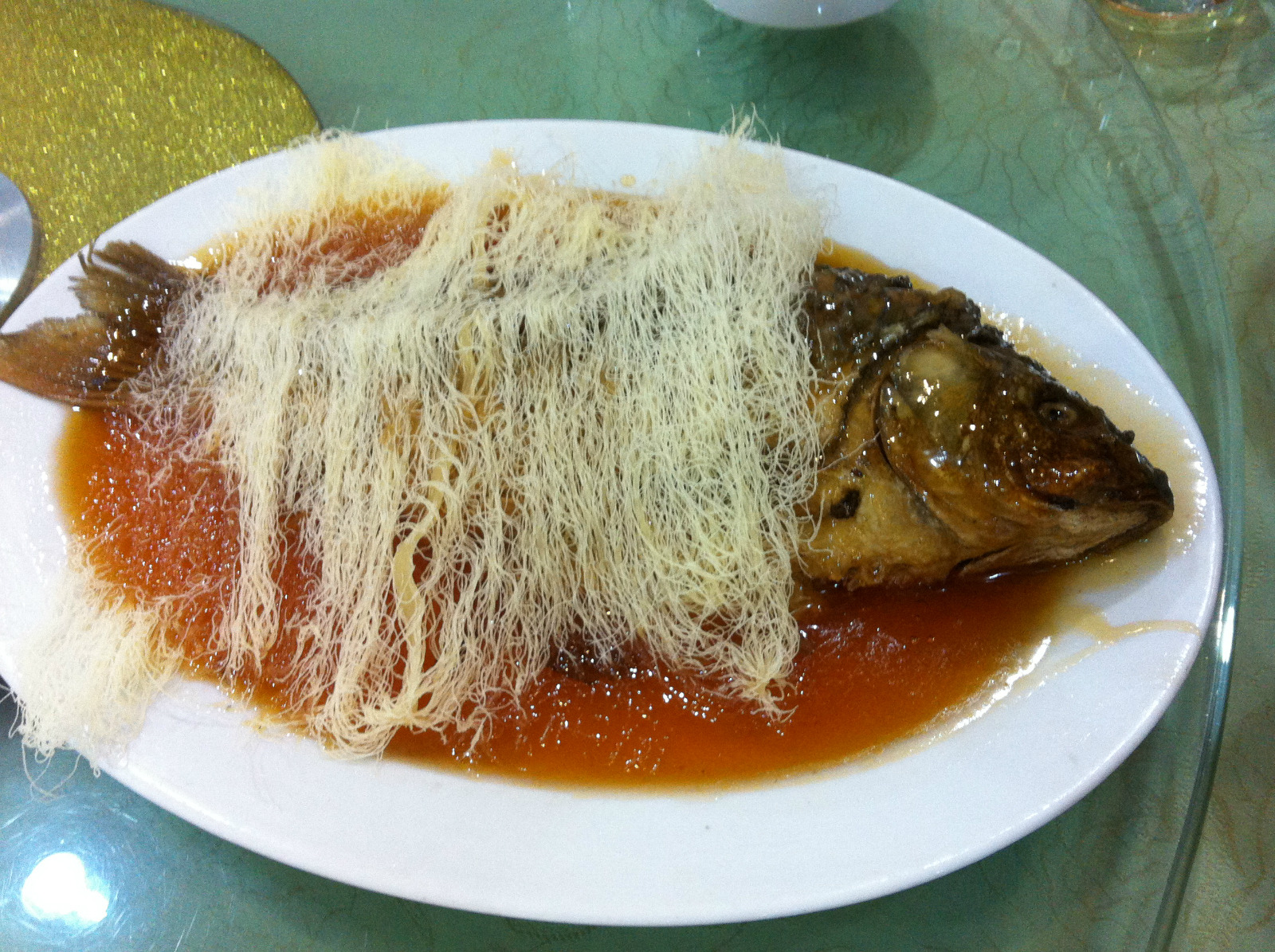 事先在网上做了些功课得知有两家比较正宗鲤鱼培面着实不错面很细炸得