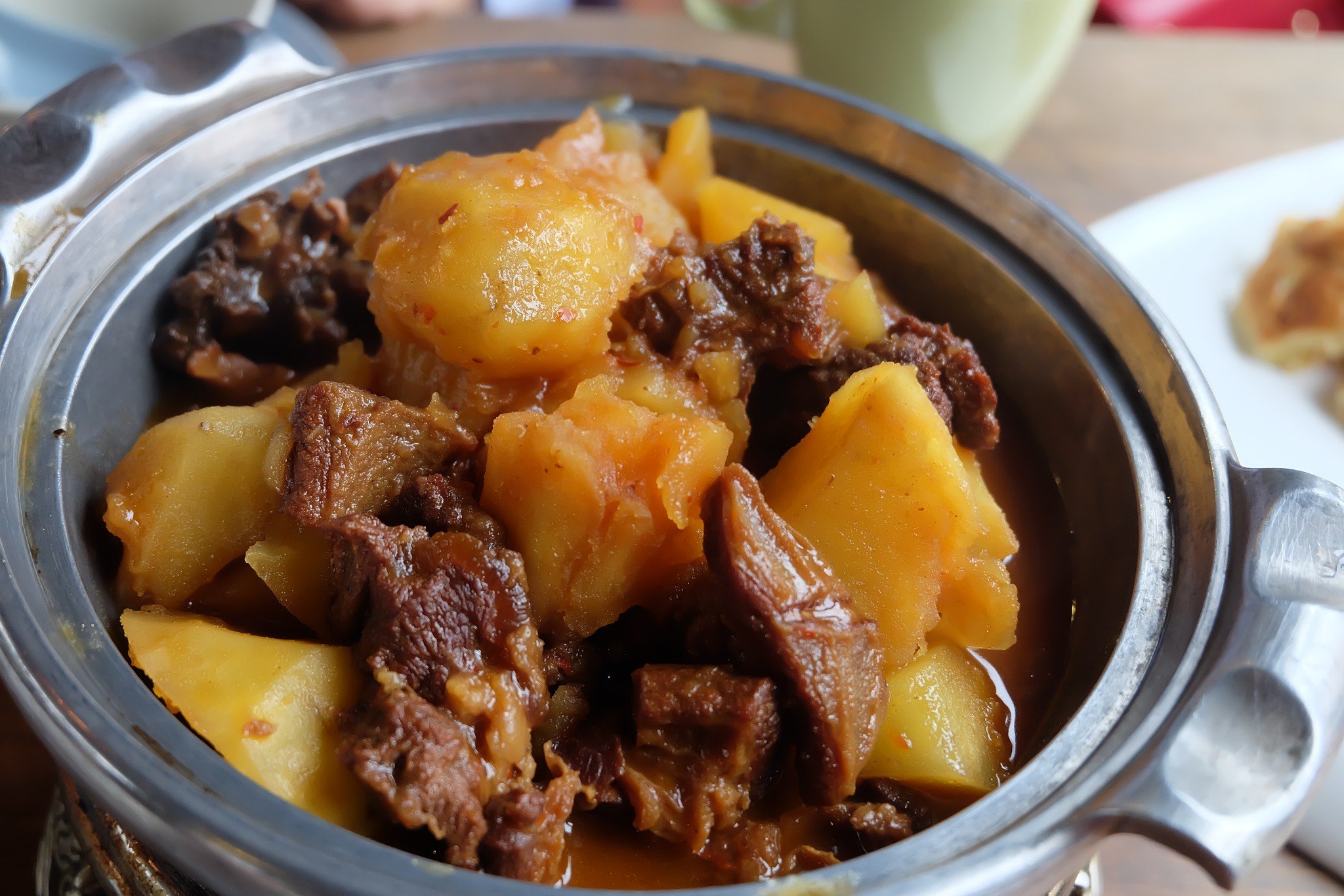 杂菜烩(束河古镇)推荐指数:☆☆☆推荐菜:锅仔土豆炖牛腩(味道浓郁很