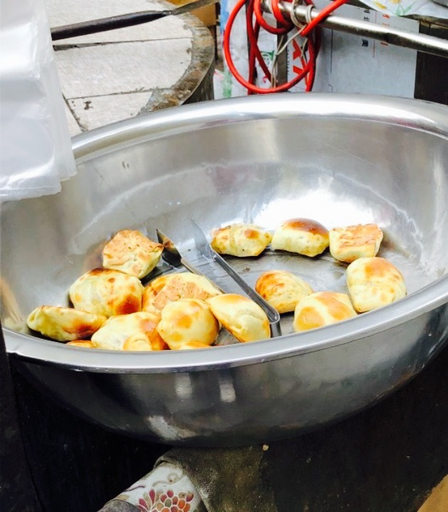 亚生江烤包子店